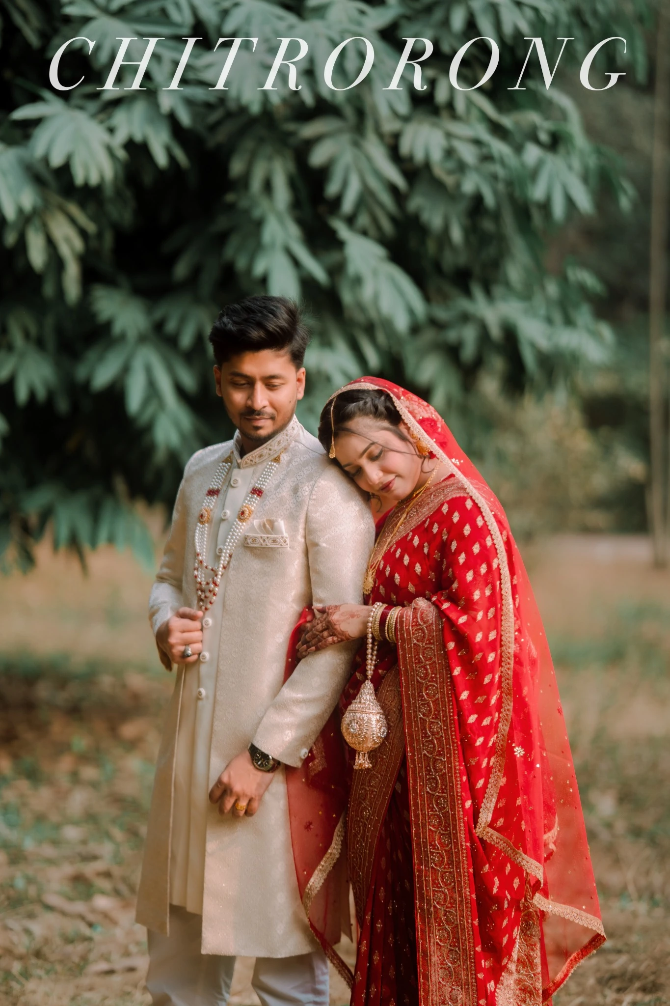 White wedding couple in a flowing veil